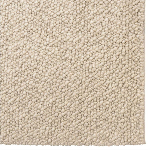 Tapis rectangulaire en laine bouclée couleur beige QUENTIN